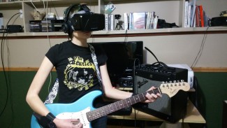 Sophia Madsen plays live in Riftmax Theater with the Razer Hydra motion controller strapped to her hands so her avatar's hands would mimic her strumming. The virtual world Second Life has been used extensively for virtual performances.